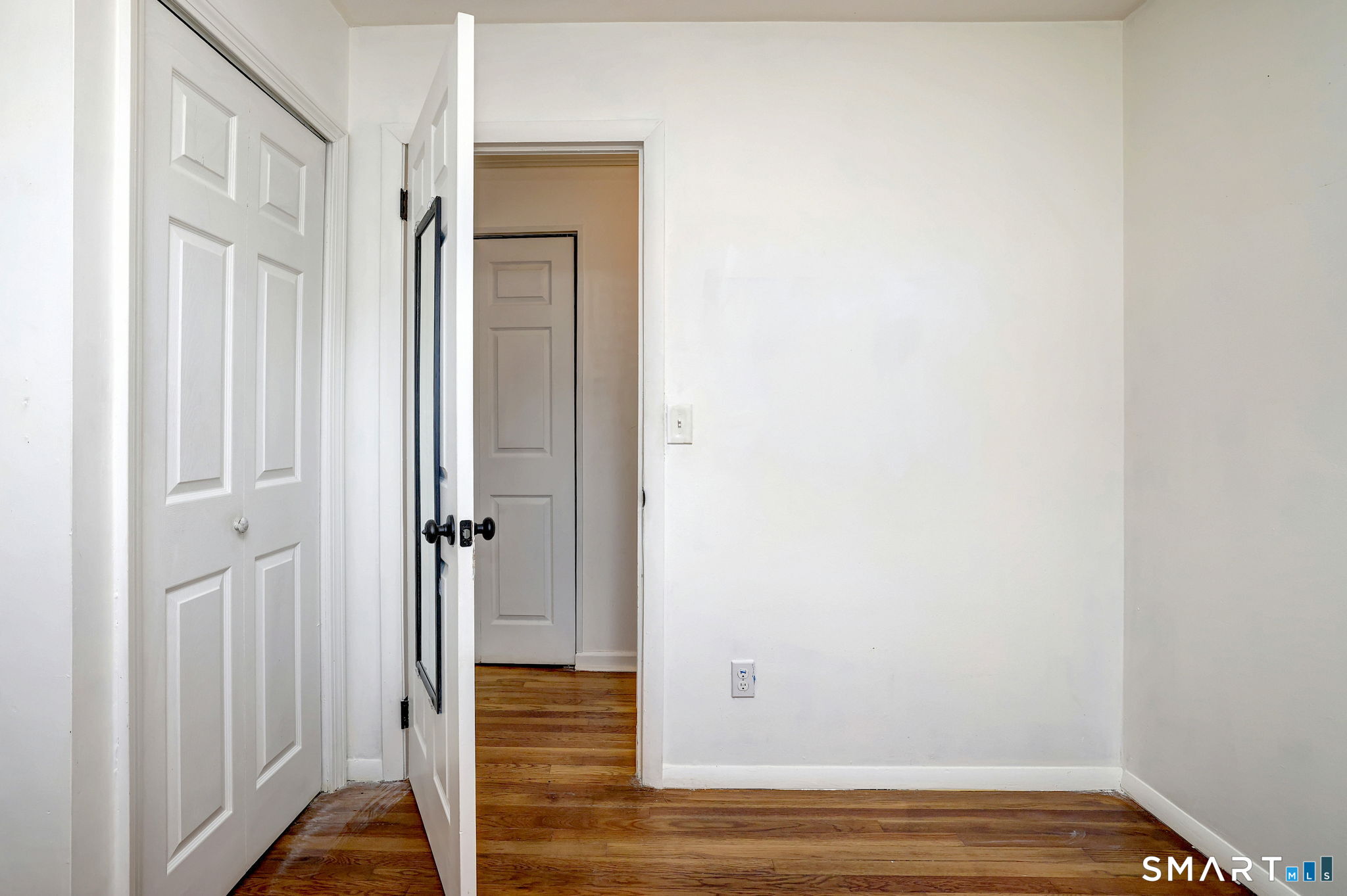 42 Highland Avenue Ansonia, CT 06401 - Photo 21 of 40 a view of front door with wooden floor