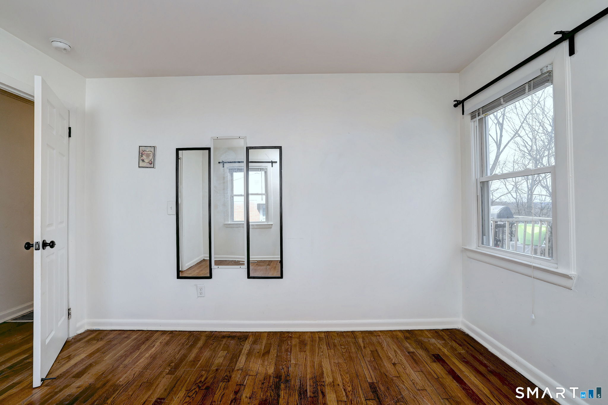 42 Highland Avenue Ansonia, CT 06401 - Photo 24 of 40 a view of front door with wooden floor