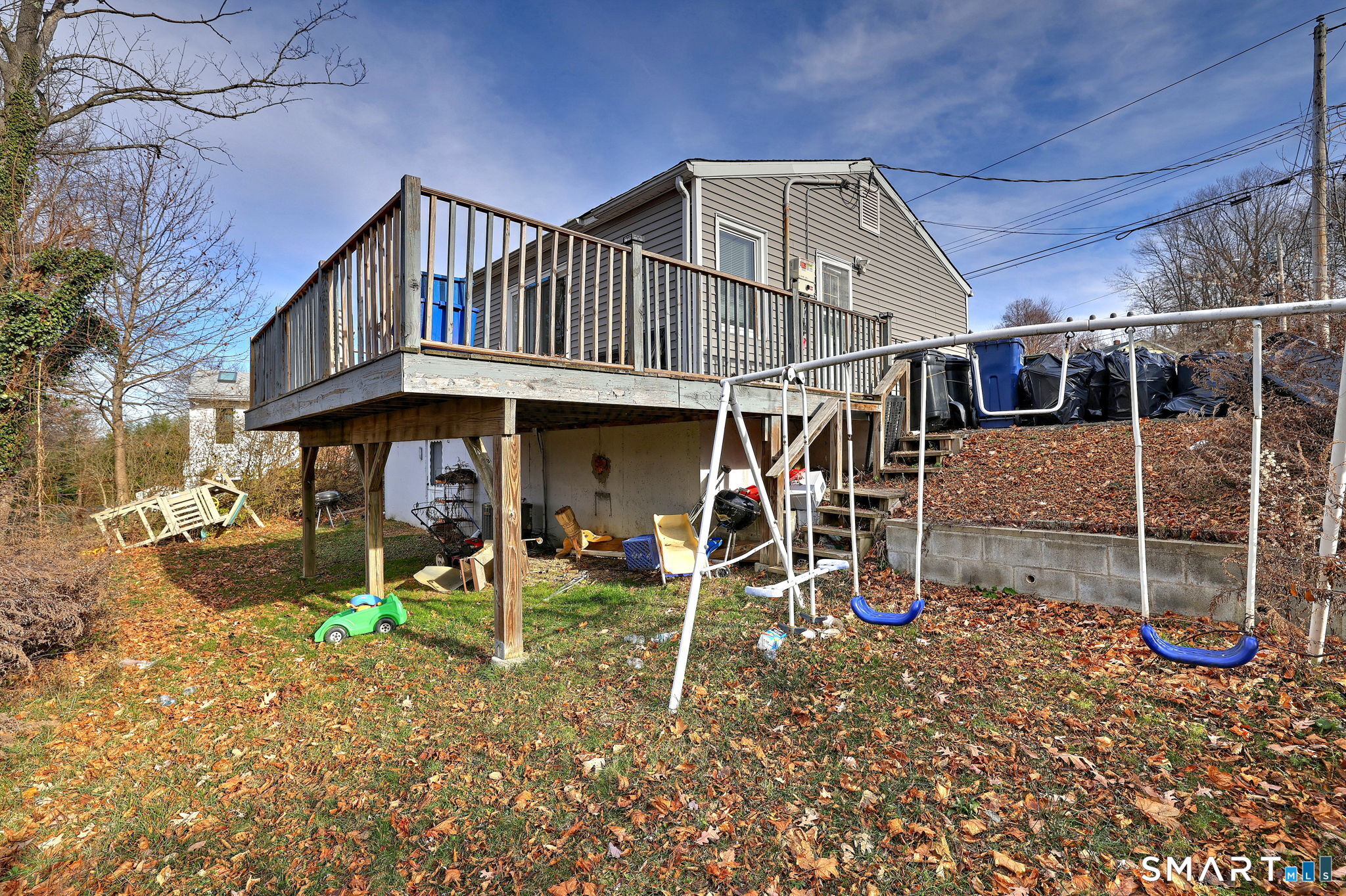 42 Highland Avenue Ansonia, CT 06401 - Photo 37 of 40 a view of a house with a yard and wooden fence