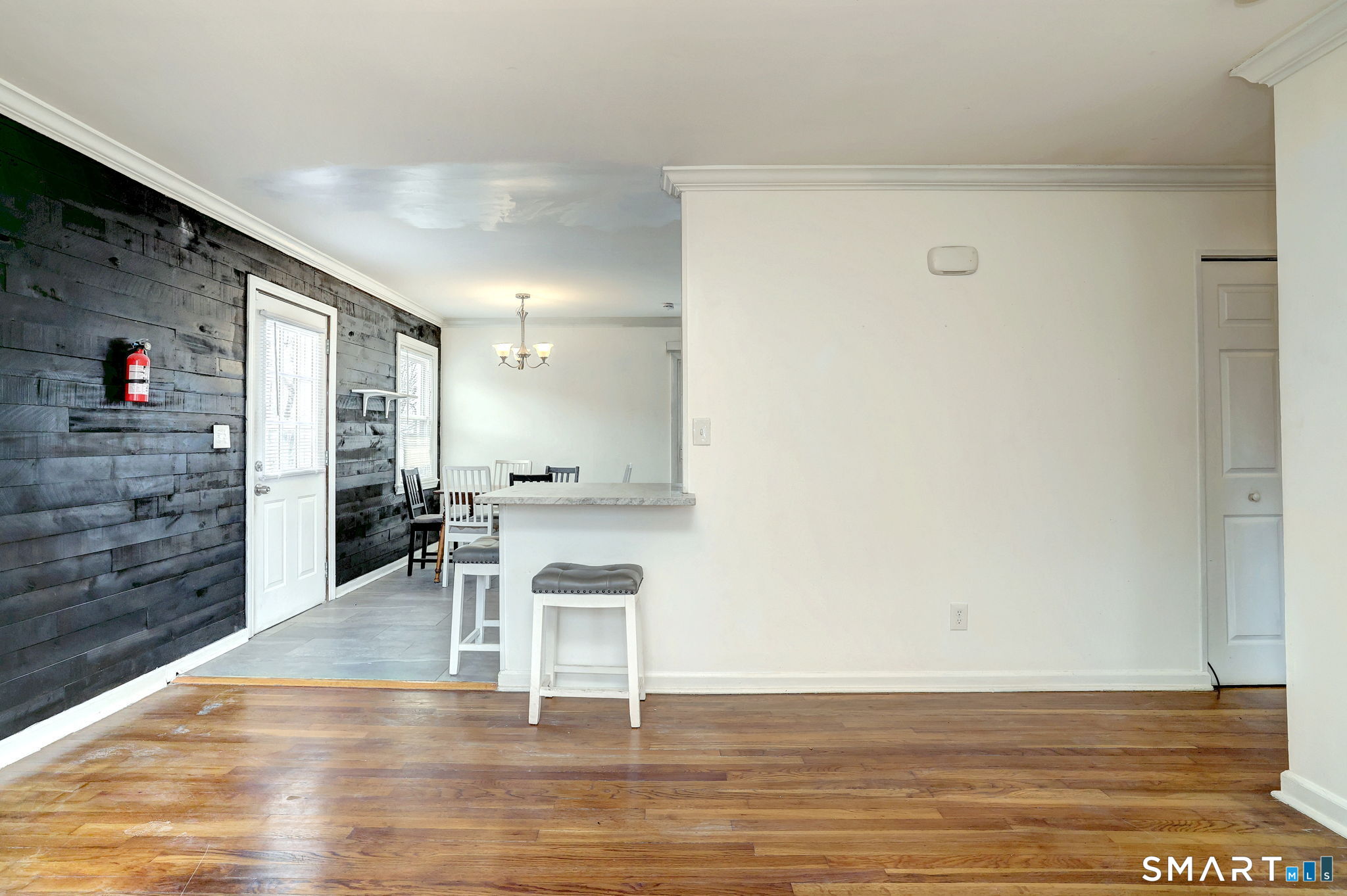 42 Highland Avenue Ansonia, CT 06401 - Photo 10 of 40 a view of dining room with wooden floor