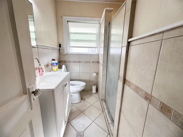 a bathroom with a sink toilet and a bathtub
