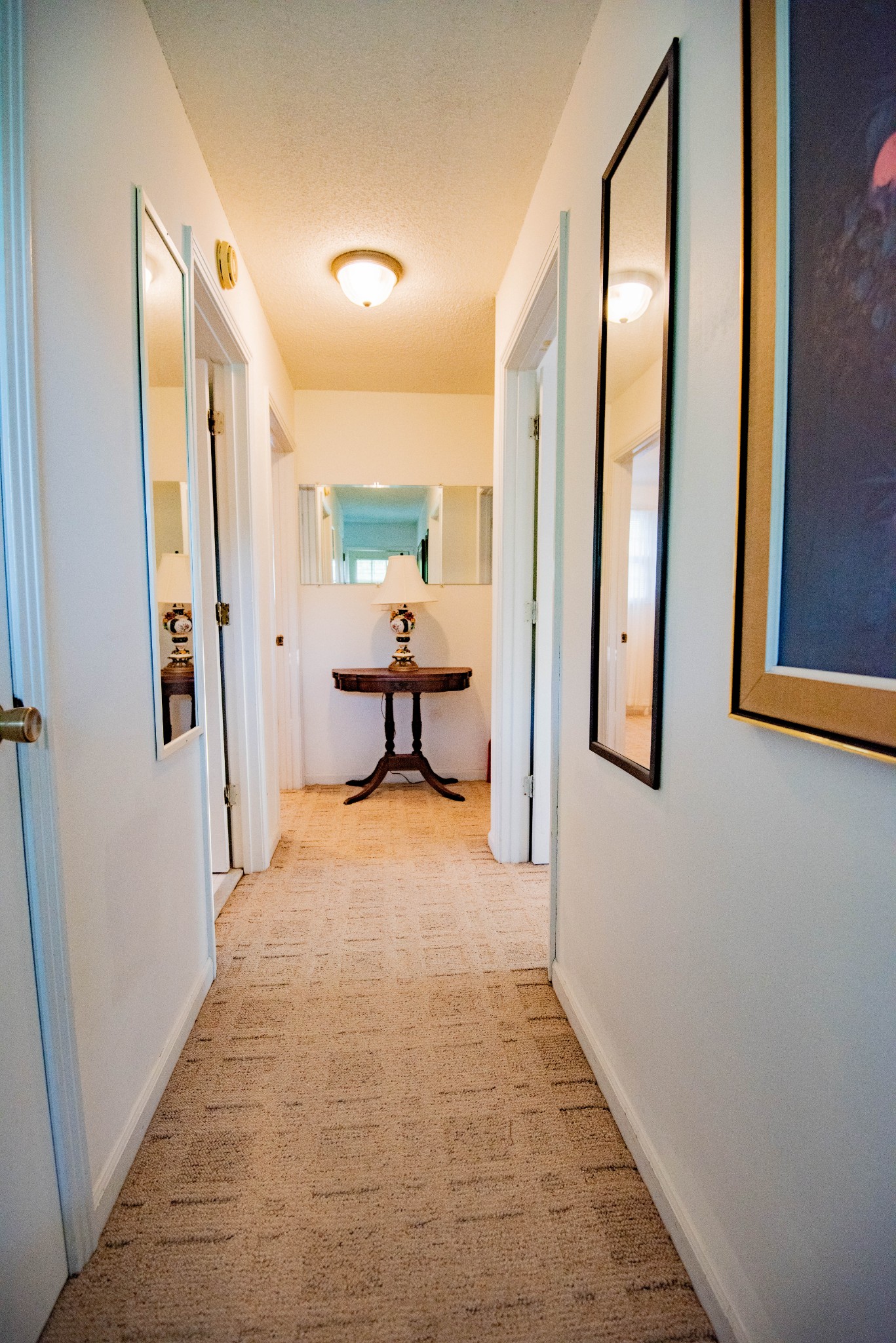 205 Green Harbor Road Old Hickory, TN 37138 - Photo 14 of 36 a hallway with sliding door and couch