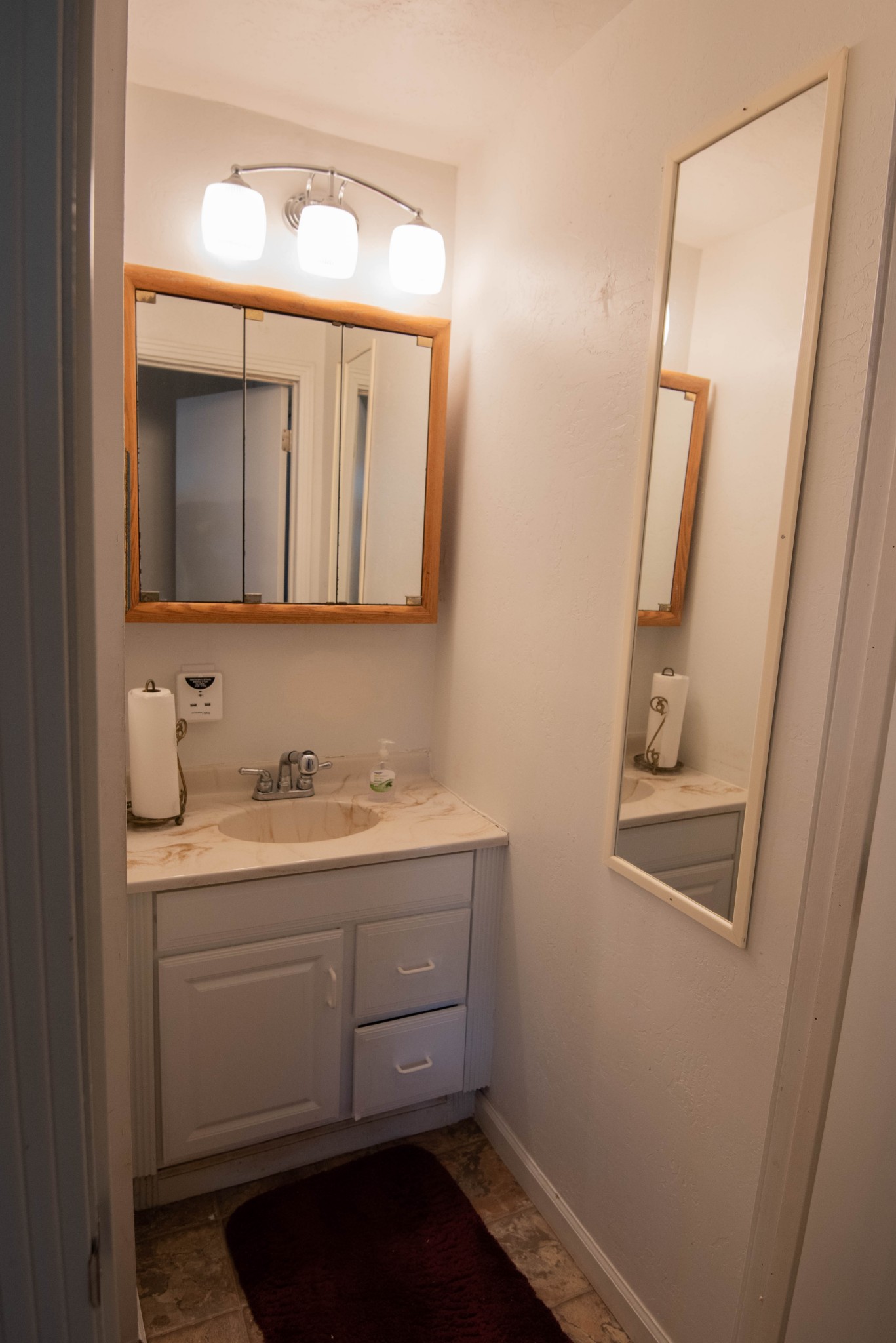 205 Green Harbor Road Old Hickory, TN 37138 - Photo 23 of 36 a bathroom with a sink a vanity and a mirror