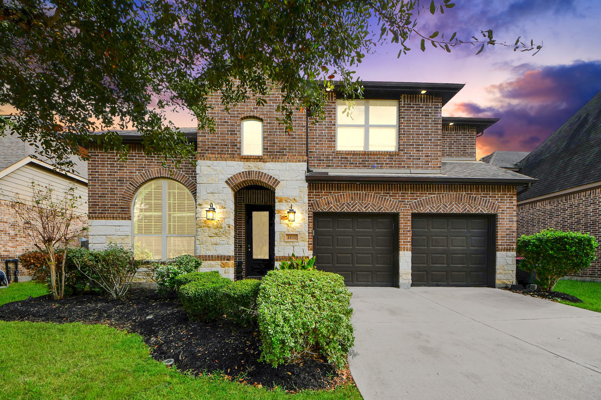 4811 Applewood Crest Lane Rosharon, TX 77583 - Photo 1 of 45 a front view of a house with a garden