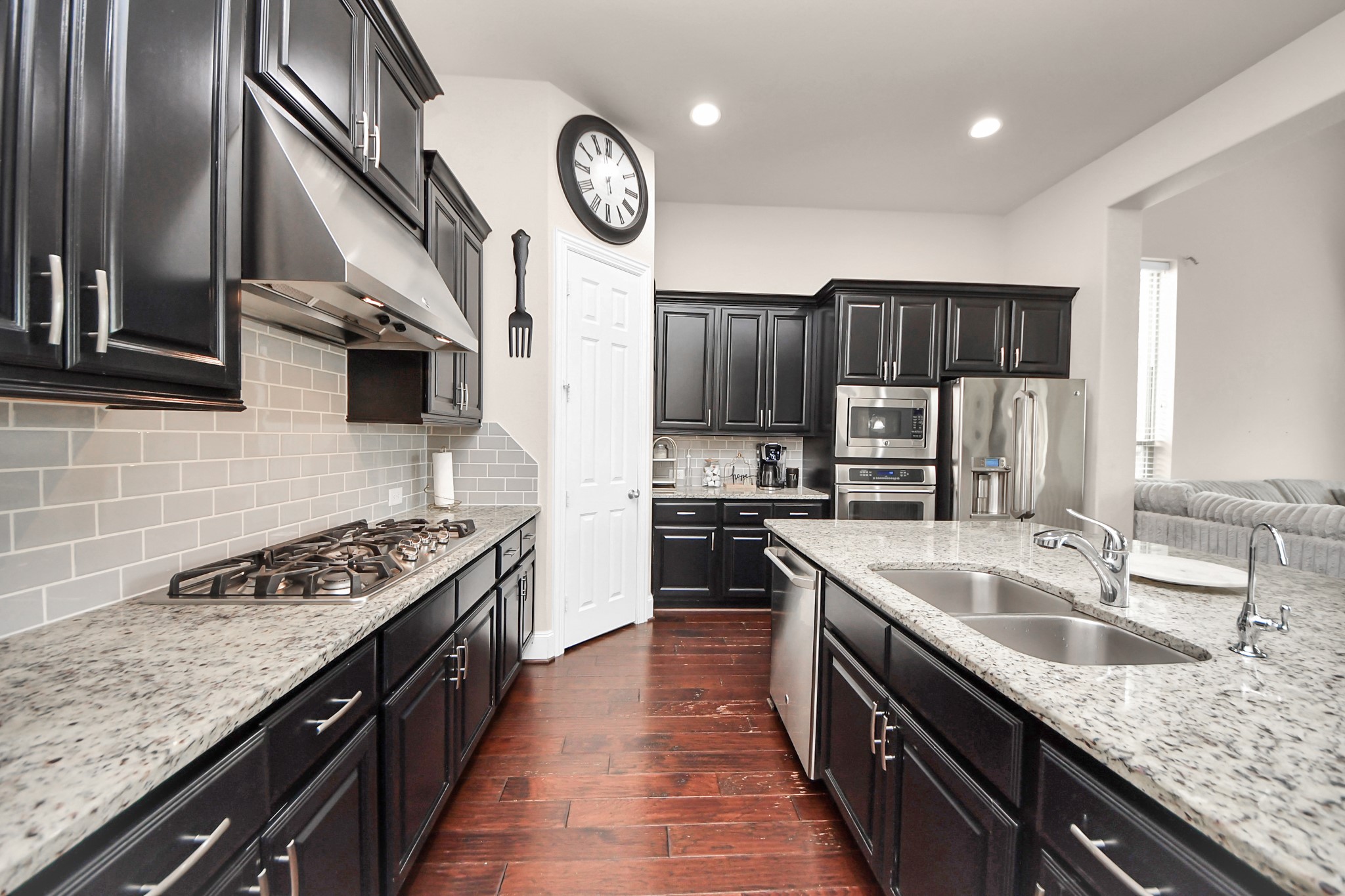 4811 Applewood Crest Lane Rosharon, TX 77583 - Photo 11 of 45 a kitchen with stainless steel appliances granite countertop a sink stove and refrigerator
