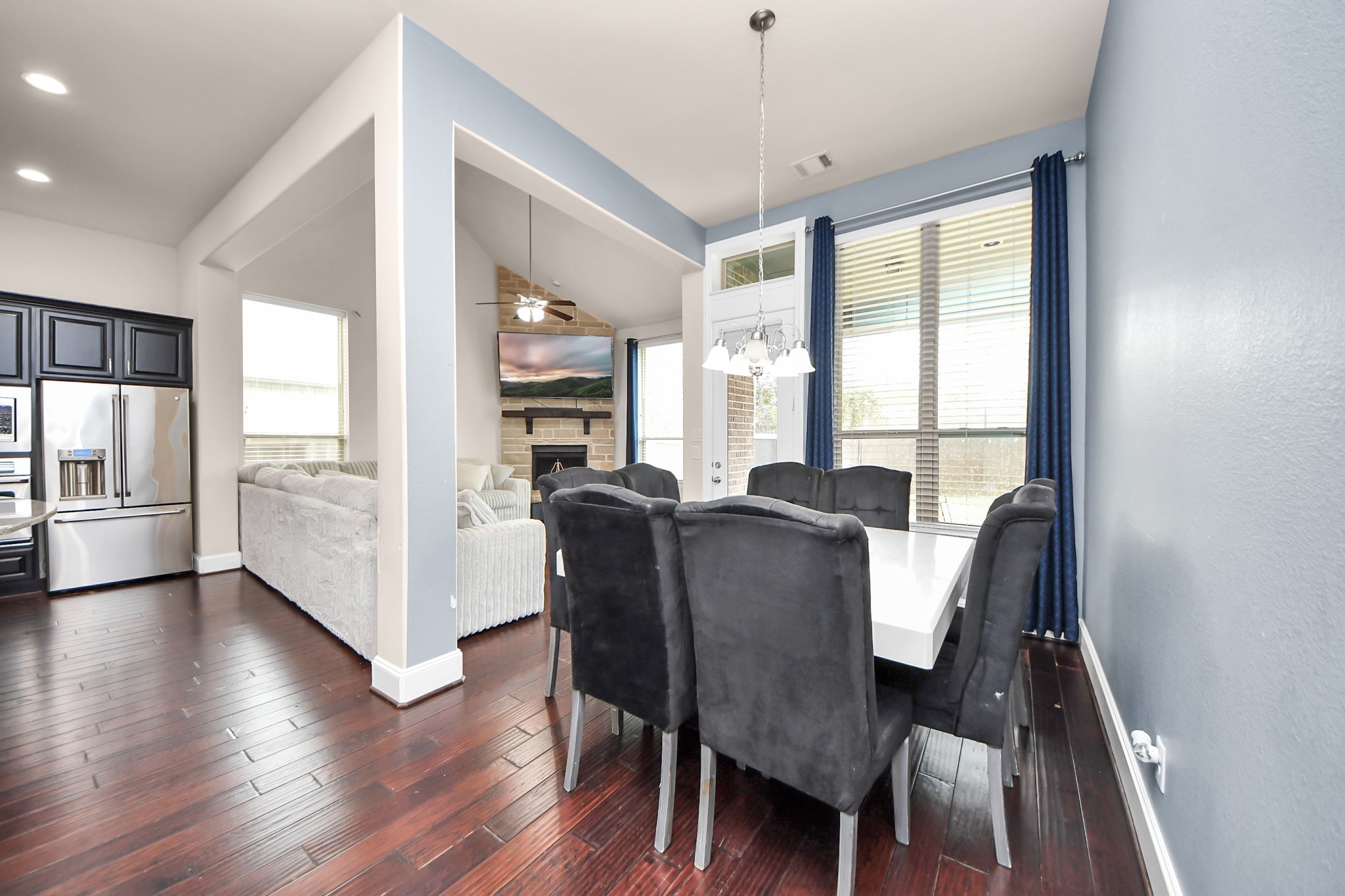 4811 Applewood Crest Lane Rosharon, TX 77583 - Photo 12 of 45 a view of a dining room with furniture window and wooden floor