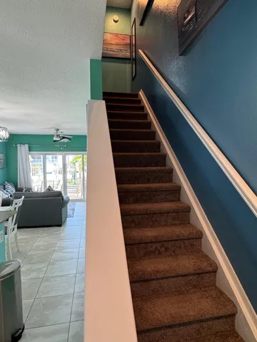 a backyard of a house with seating space