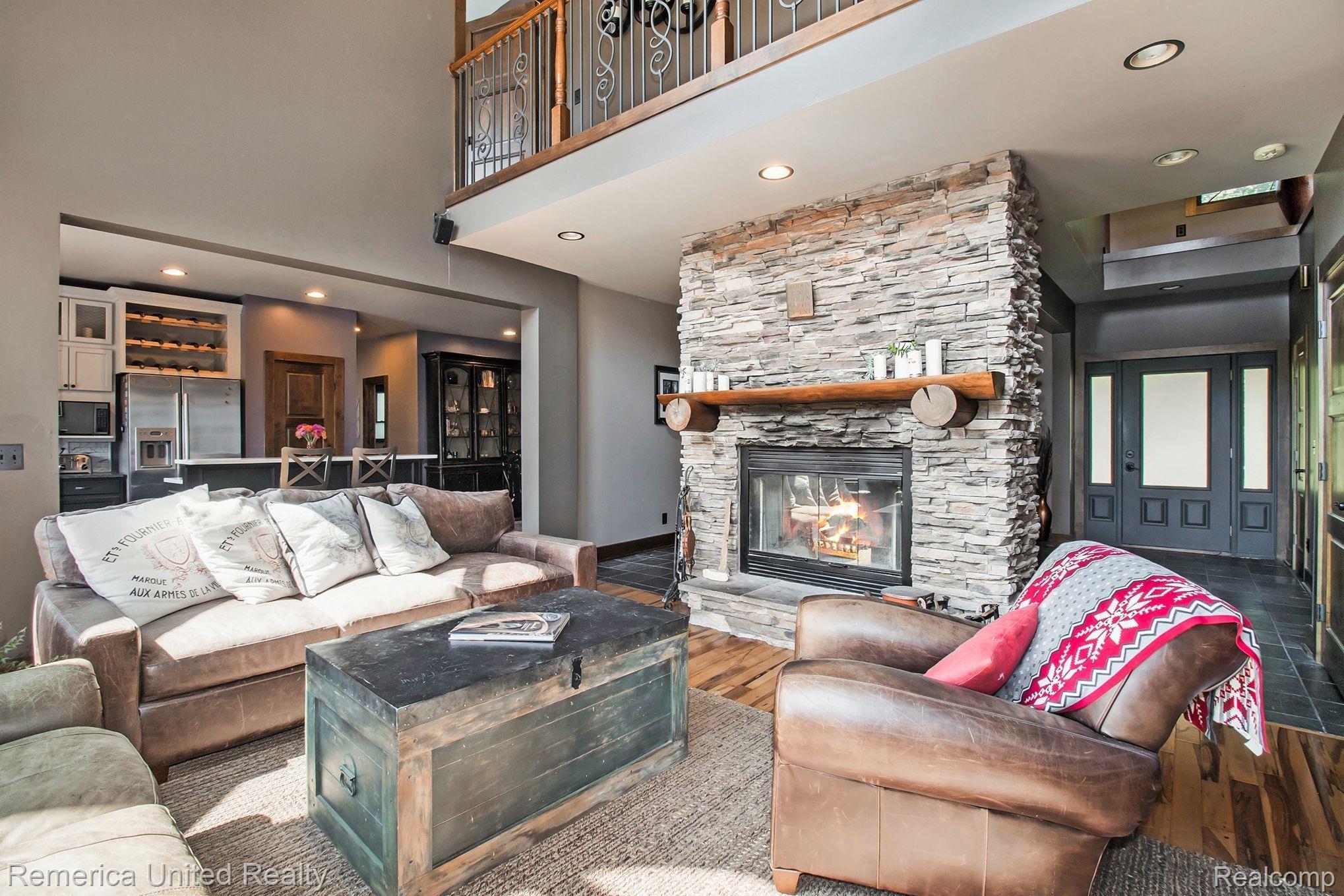 3470 East Highland Road Howell, MI 48843 - Photo 20 of 66 Great Room w/Stone Fireplace