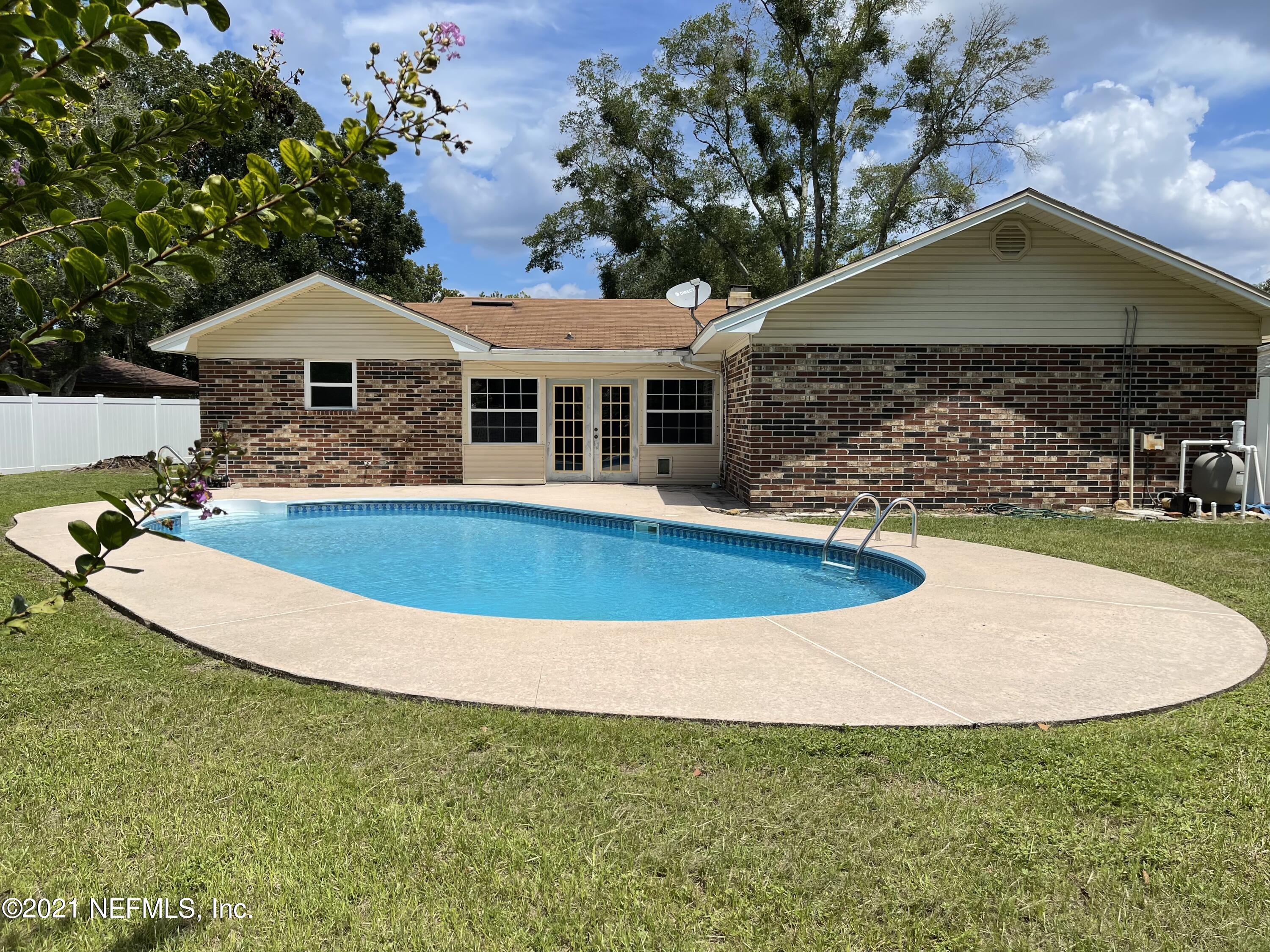 568 Rockingham Road Orange Park, FL 32073 - Photo 2 of 38 Huge backyard with in-ground pool