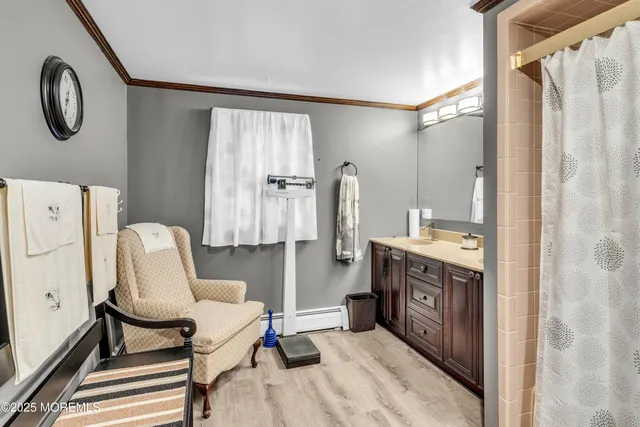 a spacious bathroom with a double vanity sink and a mirror