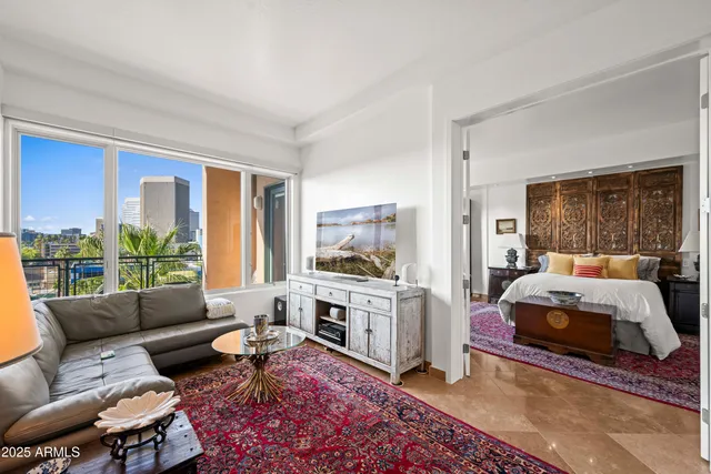 a bed room with a bed and a couch