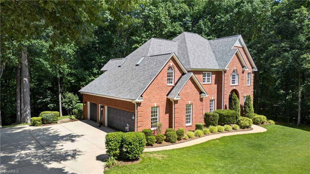 8508 Rosedale Drive Oak Ridge, NC 27310 - Photo 5 of 50 Three-car garage with room to spare.