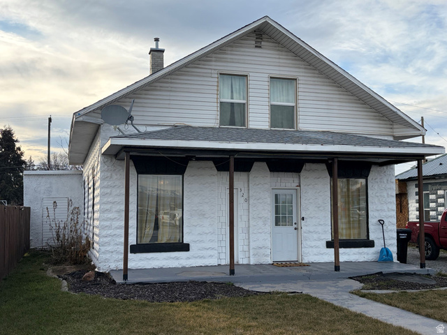 320 South State Street Preston, ID 83263 - Photo 18 of 20 View of front facade with a porch and a chimney