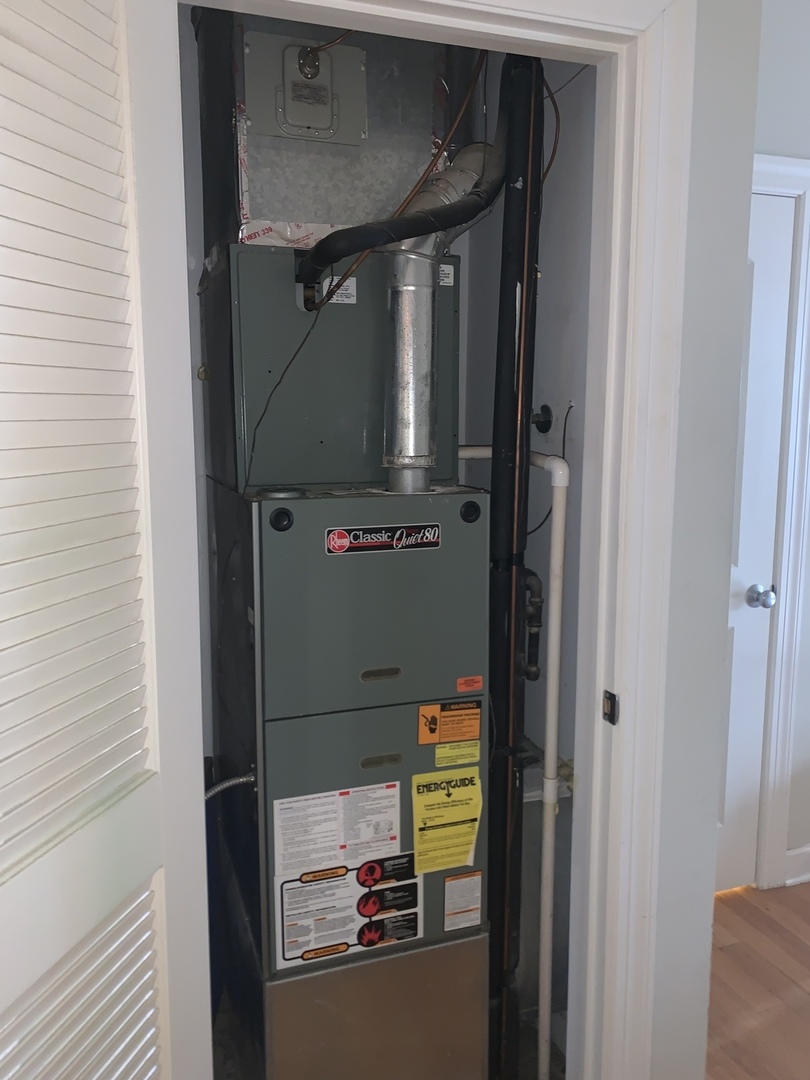 839 East 52nd Street, Unit 3 Chicago, IL 60615 - Photo 15 of 18 a close view of water heater room