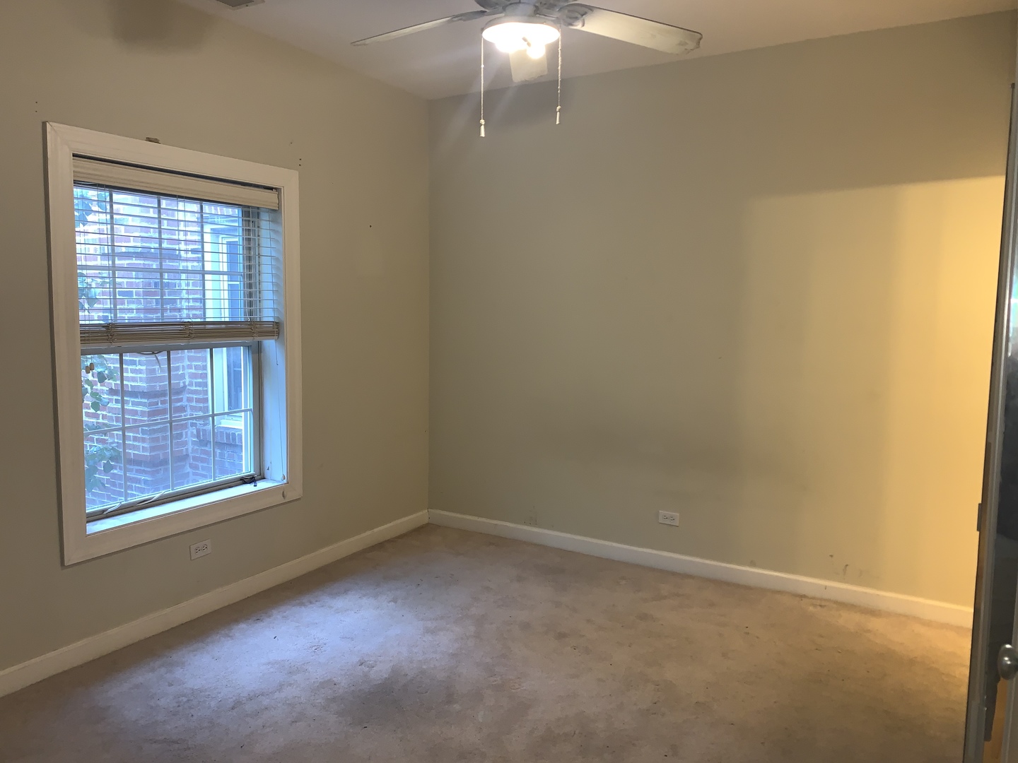 839 East 52nd Street, Unit 3 Chicago, IL 60615 - Photo 9 of 18 an empty room with a window
