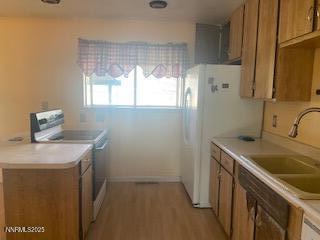 908 Wagner Drive Carson City, NV 89703 - Photo 3 of 8 a utility room with a sink washer and dryer