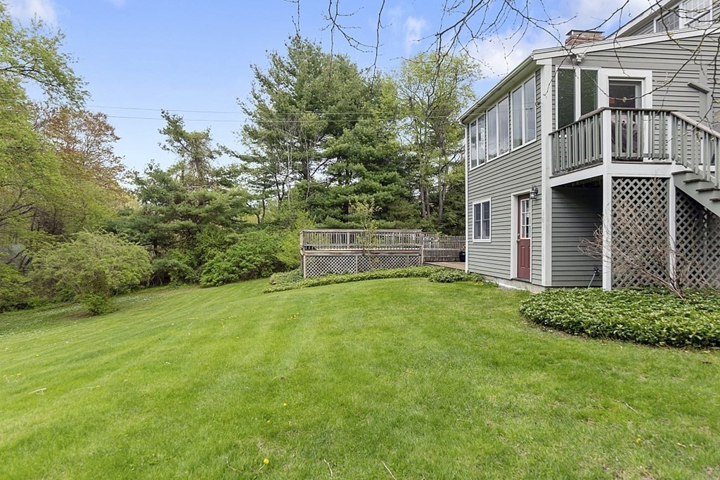 7 Cameron Road Harvard, MA 01451 - Photo 35 of 42 a front view of a house with a yard