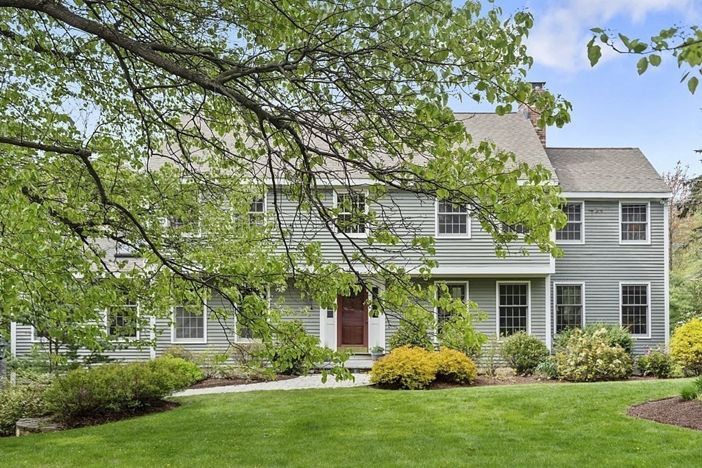 7 Cameron Road Harvard, MA 01451 - Photo 39 of 42 a front view of a house with garden