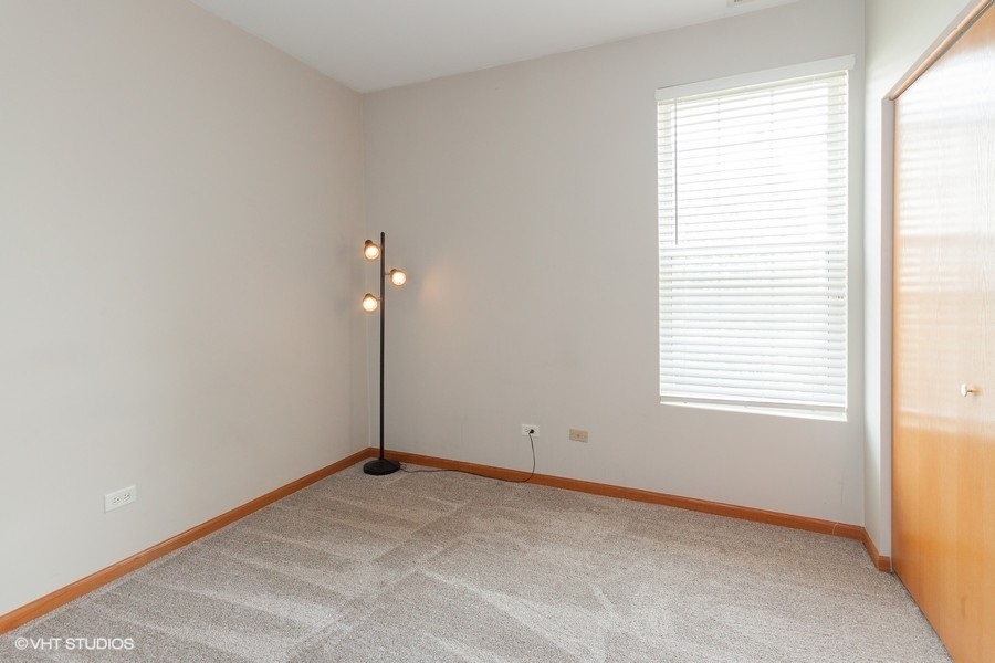 5111 Freeport Court Plainfield, IL 60586 - Photo 14 of 24 a view of a room that has a window in it