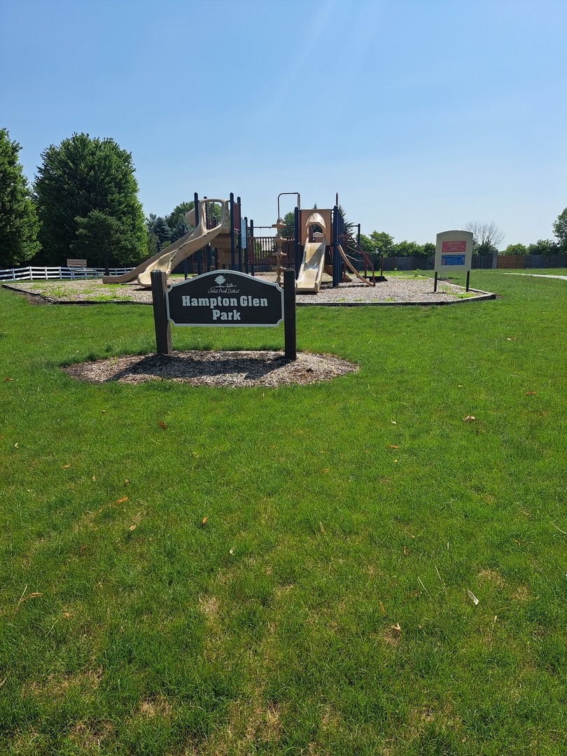 5111 Freeport Court Plainfield, IL 60586 - Photo 3 of 24 a view of a garden with houses