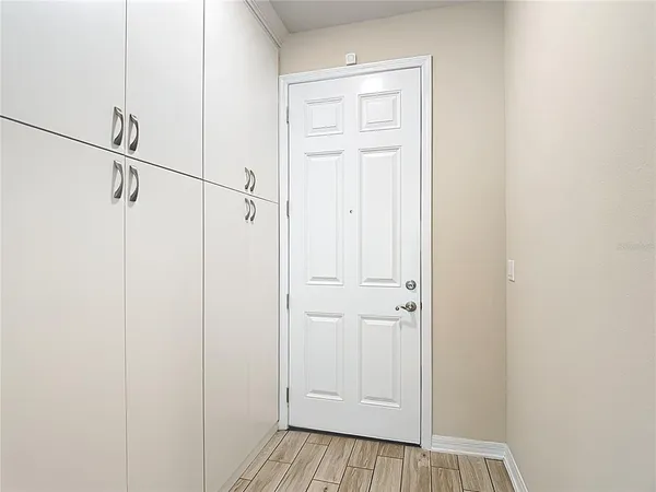 a view of a room with racks on the wall