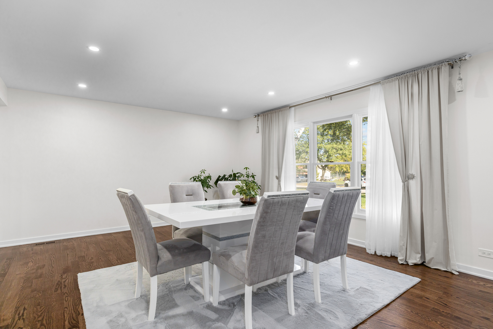 700 Fairfield Lane Algonquin, IL 60102 - Photo 3 of 39 a view of a dining room with furniture and wooden floor