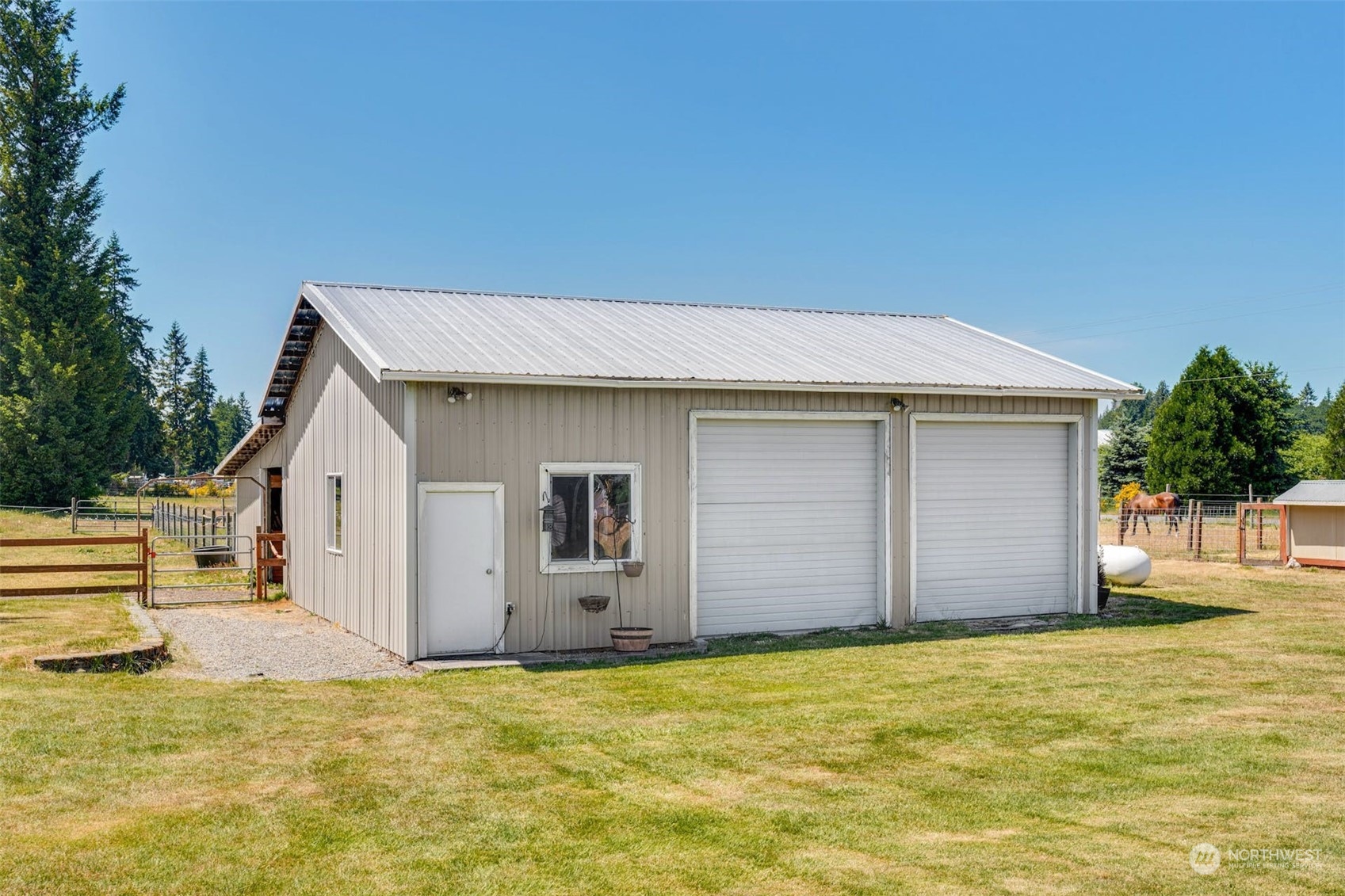 16401 Sheldon Lane Southwest Rochester, WA 98579 - Photo 27 of 40 a view of a backyard with a garden
