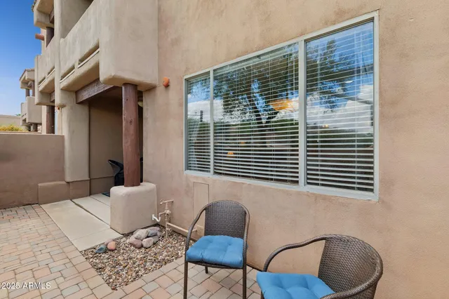 a kitchen with a sink cabinets and window