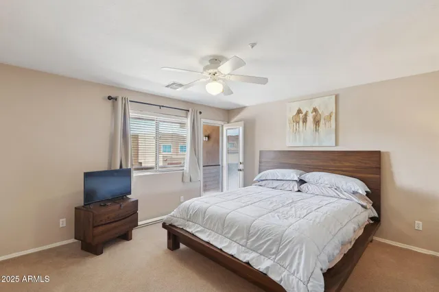a kitchen with a white stove and a refrigerator