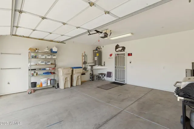 a view of a patio with couches and a potted plant