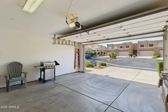 a view of a garage with furniture