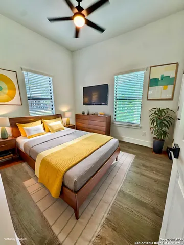 a bathroom with a sink toilet and mirror