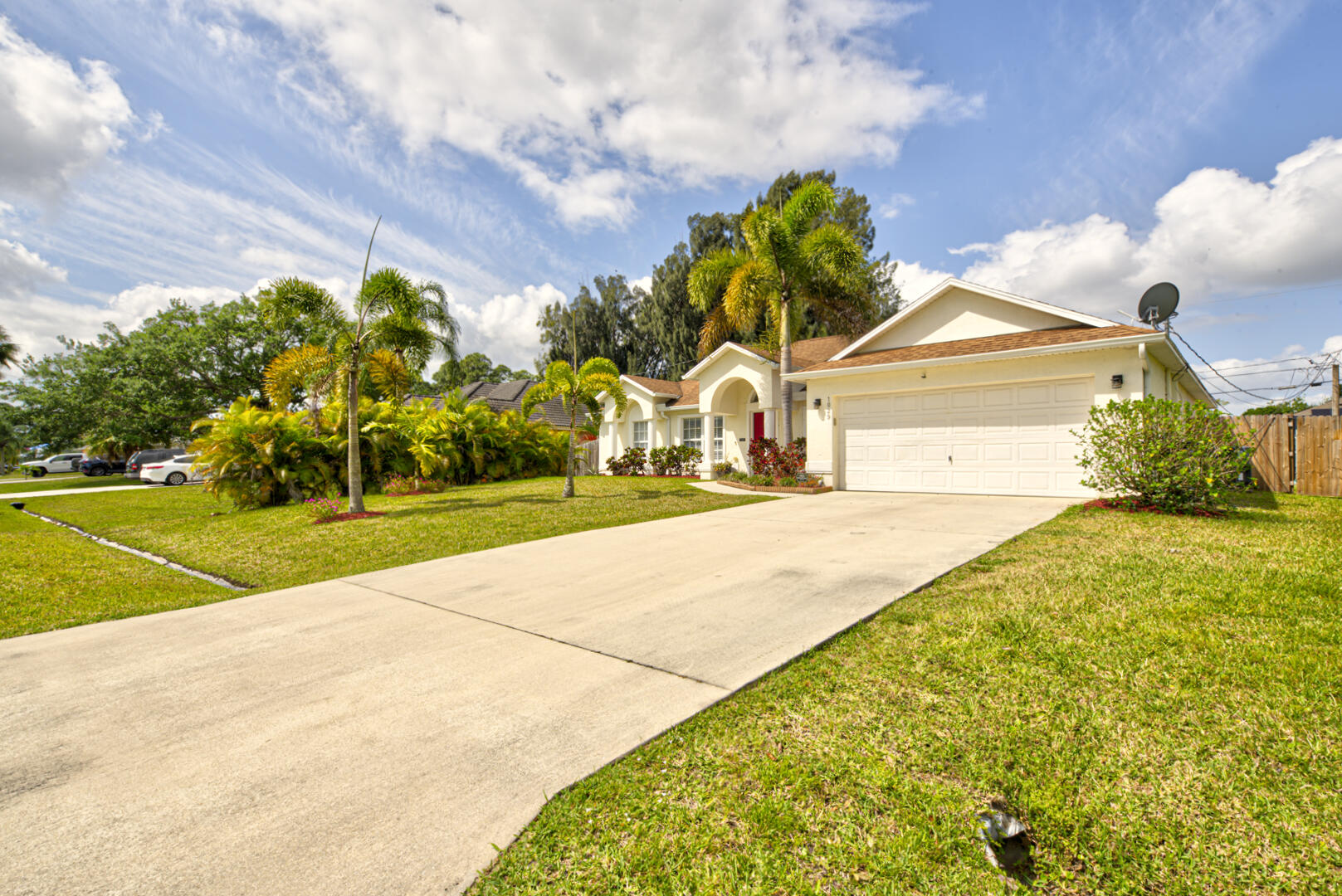 1029 Southwest Bay State Road Port St. Lucie, FL 34953 - Photo 2 of 39 a view of backyard of the house
