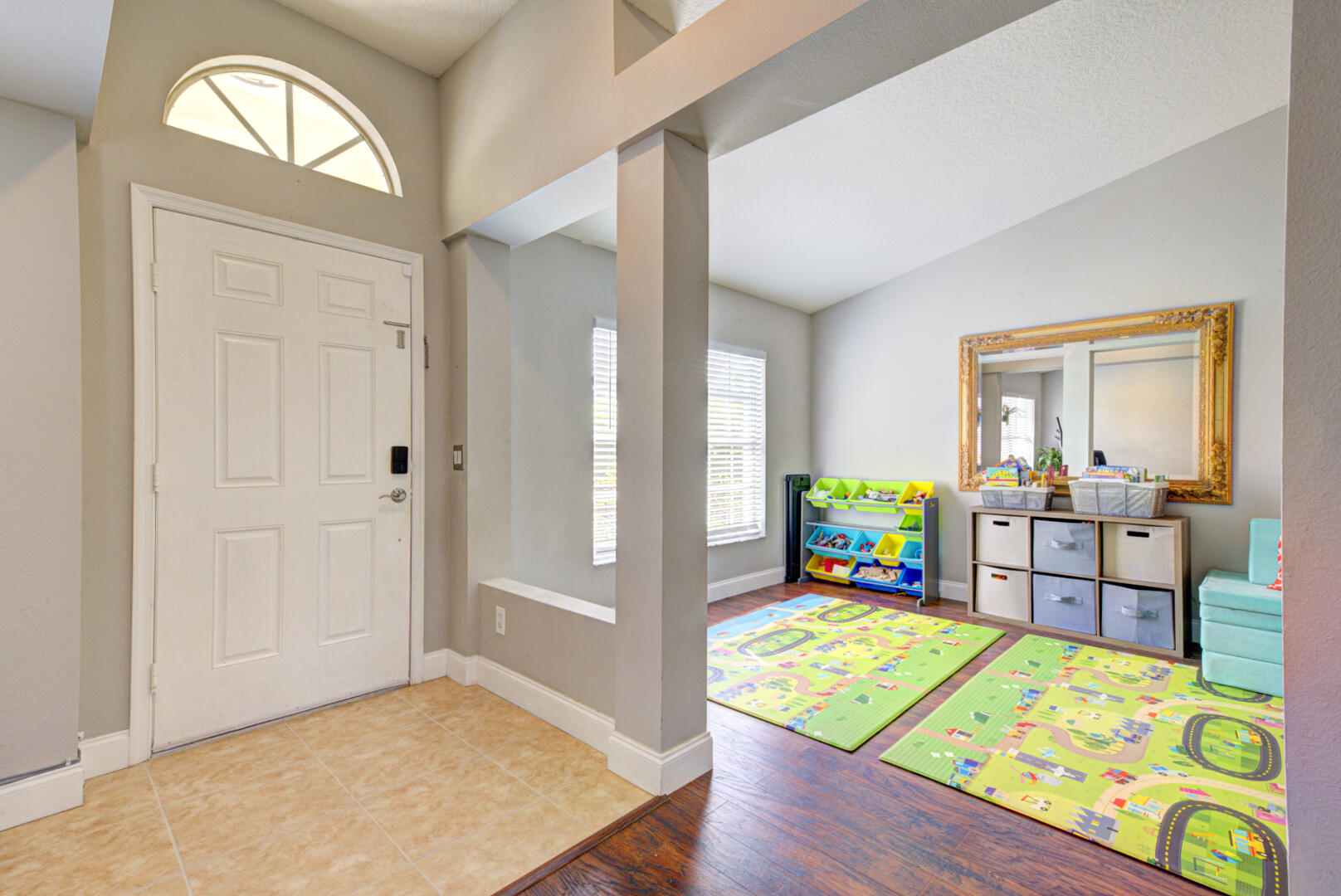 1029 Southwest Bay State Road Port St. Lucie, FL 34953 - Photo 6 of 39 a view of a bedroom with furniture and a bed