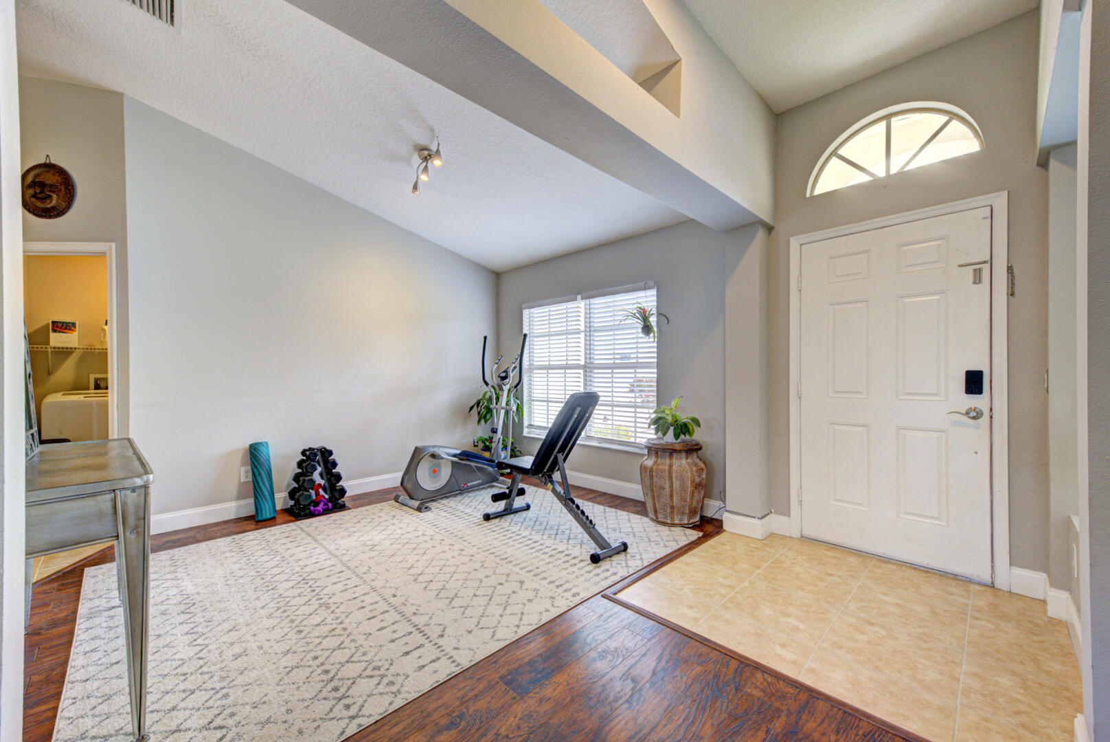 1029 Southwest Bay State Road Port St. Lucie, FL 34953 - Photo 10 of 39 a room with furniture and a window