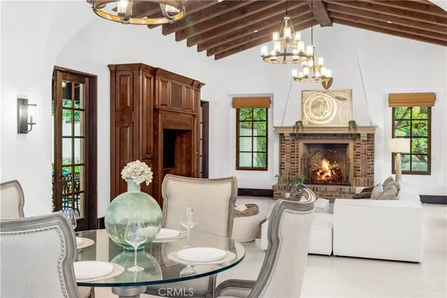 a kitchen with stainless steel appliances granite countertop a sink a stove and cabinets