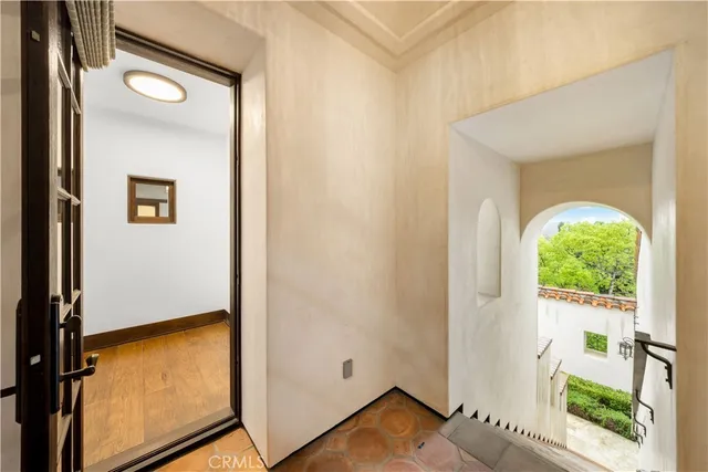 a view of a balcony with a tree