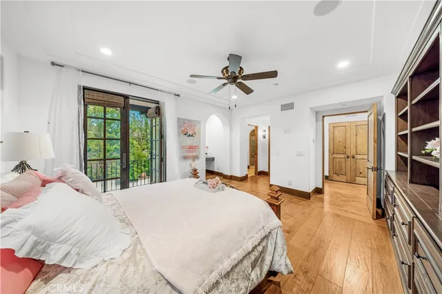 a backyard of a house with garden and outdoor seating