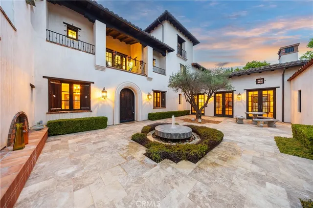 a view of a backyard with sitting area