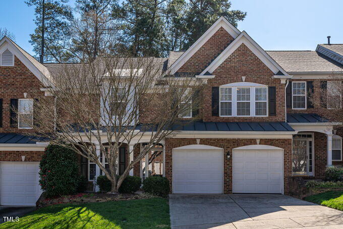 3742 Old Post Road Raleigh, NC 27612 - Photo 1 of 35 a front view of a house with garden