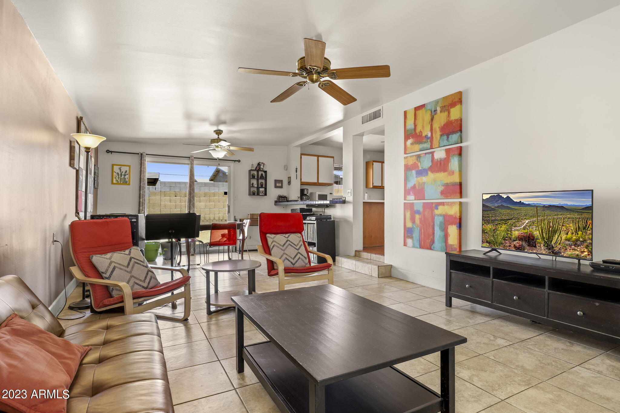 1536 East Mountain View Road Phoenix, AZ 85020 - Photo 13 of 45 Living room view to dining & kitchen