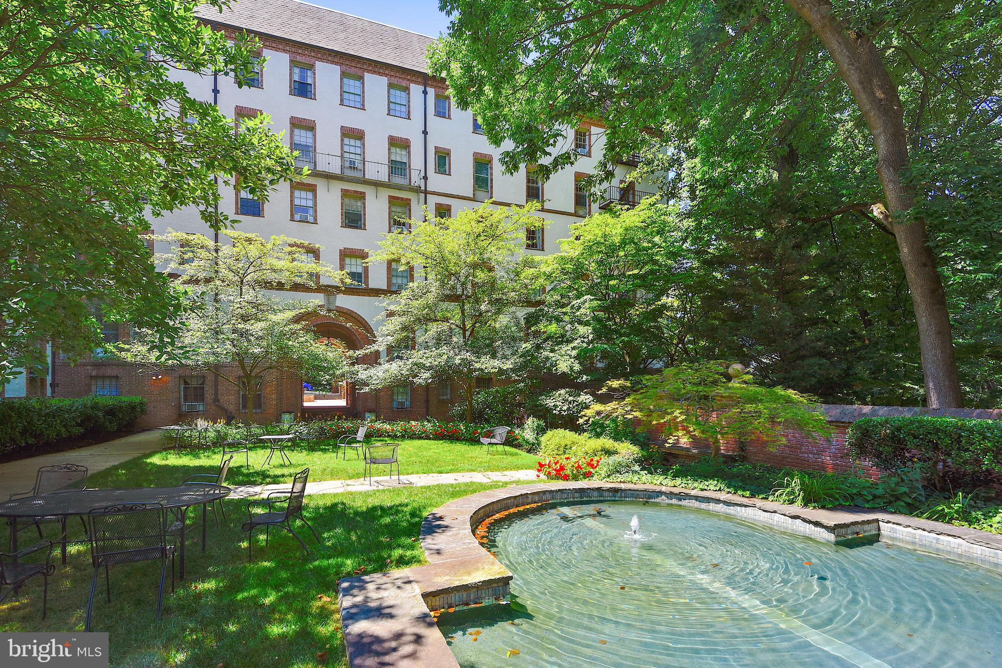6 Upland Road, Unit K2 L2 Baltimore, MD 21210 - Photo 3 of 55 Courtyard with pond and sitting areas