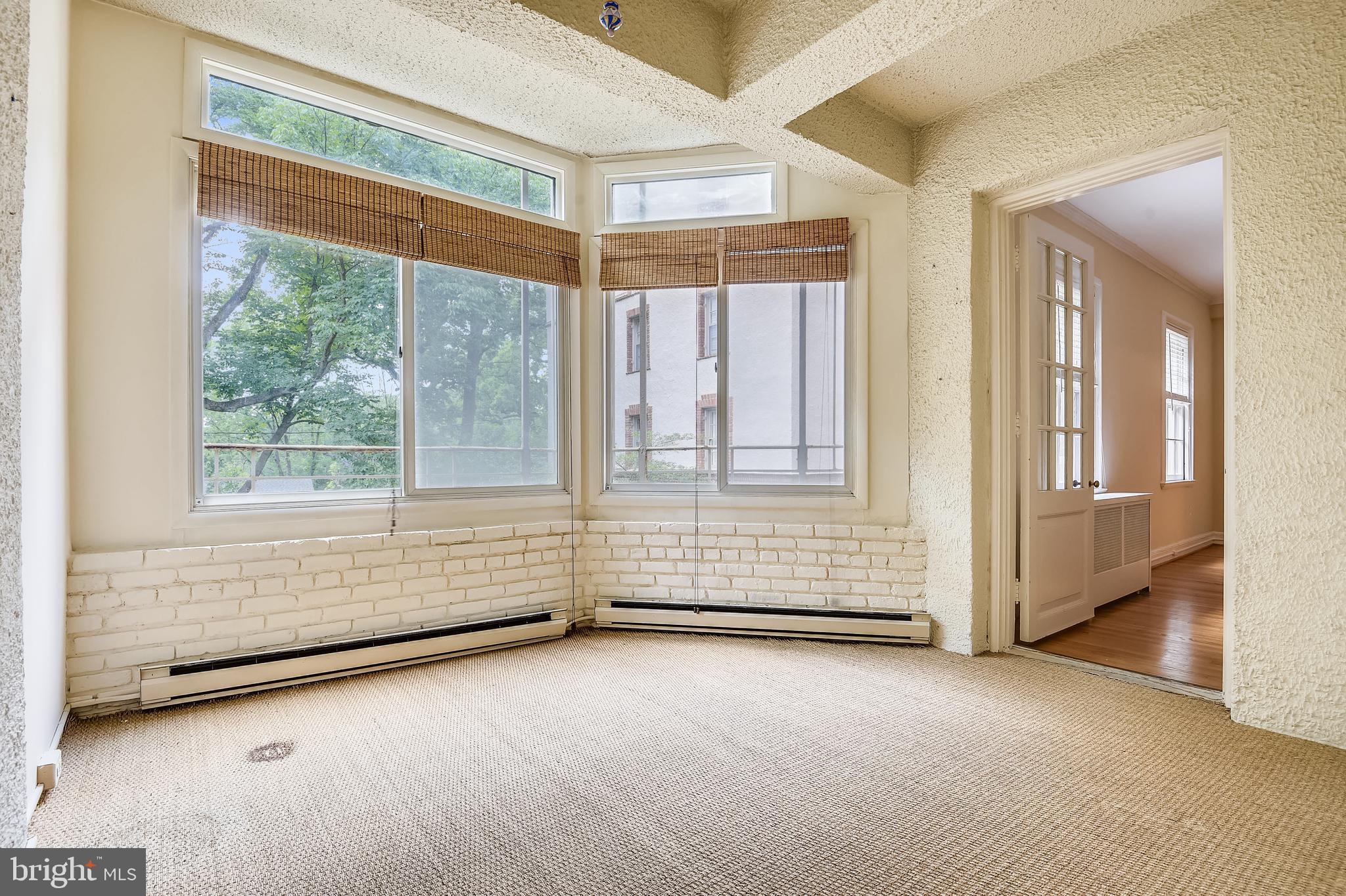 6 Upland Road, Unit K2 L2 Baltimore, MD 21210 - Photo 40 of 55 Sun porch with western views of the courtyard