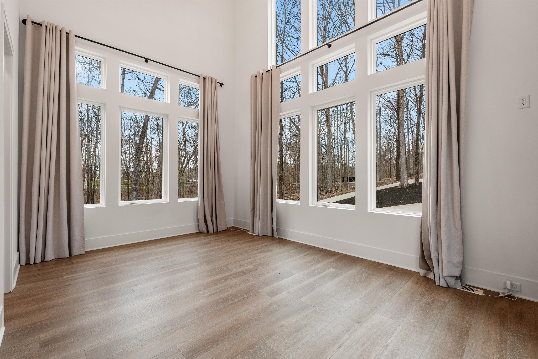 925 Weeping Willow Road, Unit D Hendersonville, TN 37075 - Photo 22 of 73 an empty room with wooden floor and windows