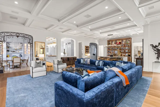 a view of a swimming pool with a patio and a yard