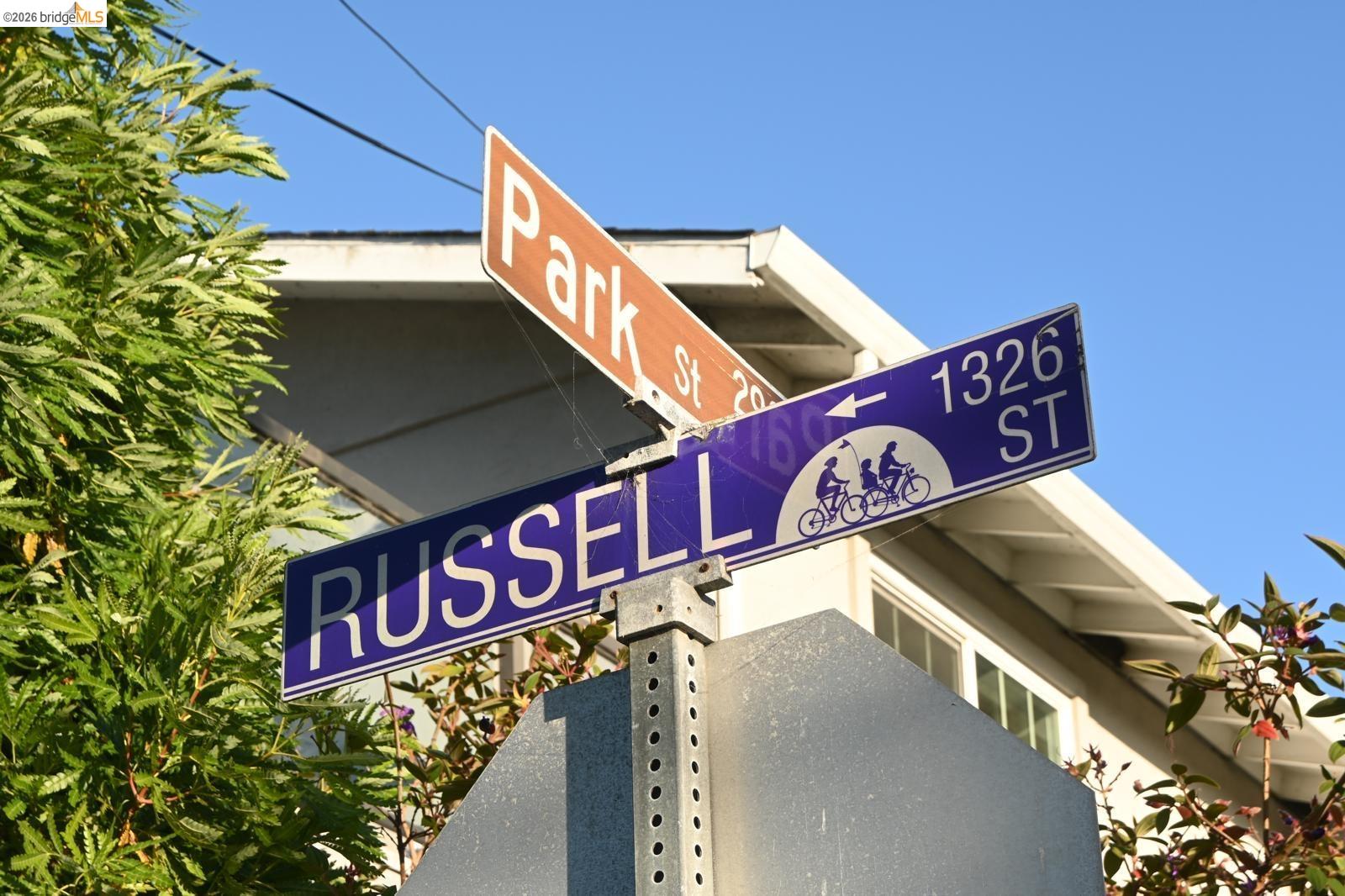 1316 Russell Street Berkeley, CA 94702 - Photo 2 of 23 a street sign on a pole on a street