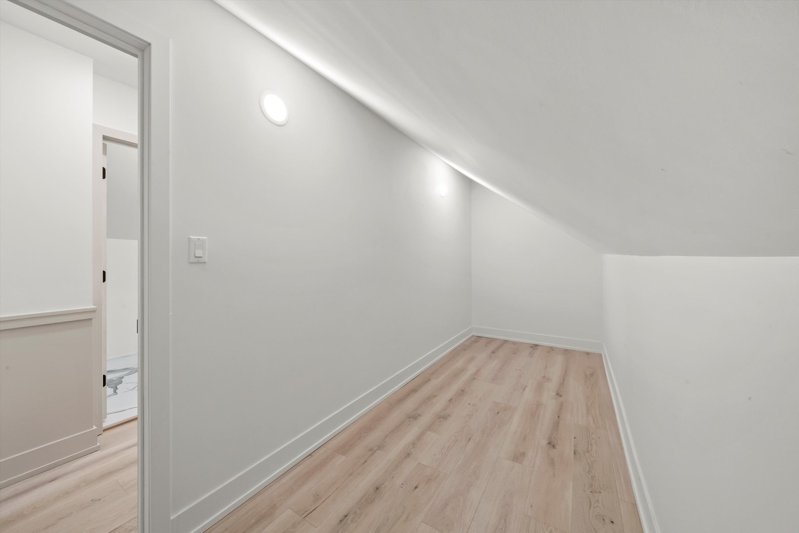 7955 South Colfax Avenue Chicago, IL 60617 - Photo 21 of 43 a view of empty room with wooden floor