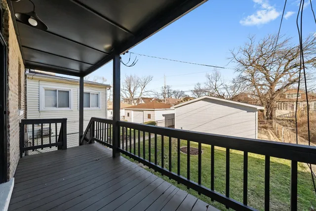 a view of backyard with sitting area