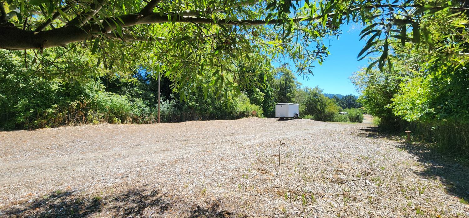 23001 Conifer Drive Monte Rio, CA 95462 - Photo 11 of 20 Looking at the upper level from near the fence. Trailer is at the edge/end of the upper level.