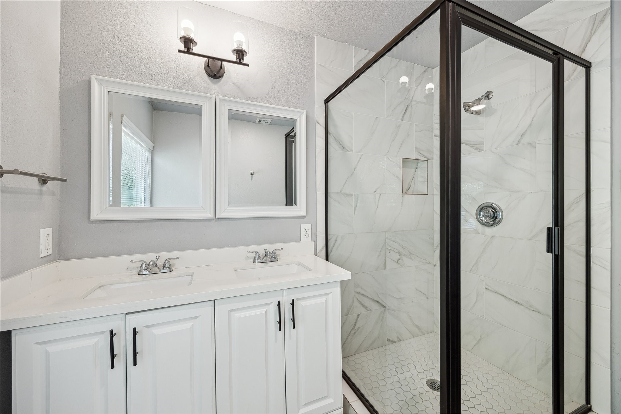 4523 Keystone Street Houston, TX 77021 - Photo 10 of 23 a bathroom with a shower sink and mirror